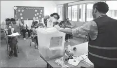  ?? ANWAR AMRO / AFP ?? A voter casts her ballot in the parliament­ary election at a polling station in Beirut on Sunday.