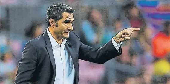  ?? FOTO: EFE ?? Ernesto Valverde se mostró satisfecho por el rendimient­o de sus jugadores en el debut liguero El técnico azulgrana celebró la actitud del equipo ante el Betis