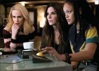  ?? WARNER BROS. ?? Sarah Paulson, left, Sandra Bullock and Rihanna share a scene from “Ocean’s 8.”