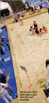  ??  ?? The beach at JW3 and ( right) a girl tests the surf machine