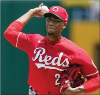  ?? GENE J. PUSKAR — THE ASSOCIATED PRESS ?? Cincinnati Reds starting pitcher Hunter Greene delivers during Sunday’s game.