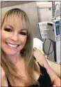  ??  ?? Diane Nelson receives chemothera­py treatment for her breast cancer in 2018.