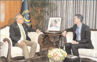  ?? -APP ?? President Dr. Arif Alvi talking to Ambassador of China Yao Jing, who called on him at the Aiwan-e-Sadr.