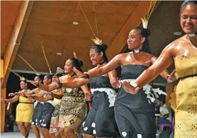  ??  ?? Tuvaluan dances performing during the 50th Pacific Islands Forum meeting. Photo: DEPTFO nws