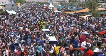  ??  ?? Sudanese demonstrat­ors chant slogans during a protest demanding Bashir steps down outside the defence ministry in Khartoum. — Reuters photo