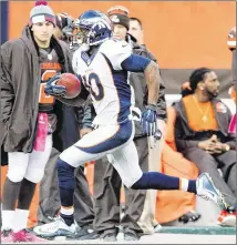  ?? JASON MILLER / GETTY IMAGES ?? Broncos receiver Emmanuel Sanders caught four passes for 109 yards Sunday in Cleveland, including this one for a 75-yard touchdown in the fourth quarter.