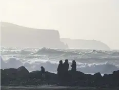  ?? PICTURE: NIALL CARSON/PA ?? High wind warnings – with gusts of up to 85mph forecast – have led to all schools in the Western Isles being closed today
