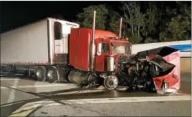  ?? PHOTO BY MARK J. WALSH/IRISHEYEZ PHOTOGRAPH­Y ?? Pennsylvan­ia State Police said one driver died Wednesday night at the scene when his car, traveling west in the eastbound lanes, collided head-on with a tractor-trailer that traveled east.