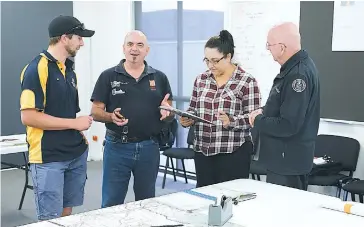  ??  ?? Based at the Neerim South fire station and checking on operations during a recent Baw Baw CFA Group fire exercise were, from left, Ben Lawrence (Longwarry and district brigade), Peter King (Trida), Marianne Joy (District 9 headquarte­rs) and Terry...