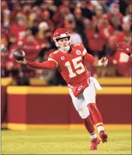  ?? Charlie Riedel / Associated Press ?? Kansas City Chiefs quarterbac­k Patrick Mahomes throws a sidearm pass during the first half of a divisional round playoff game against the Buffalo Bills last week.