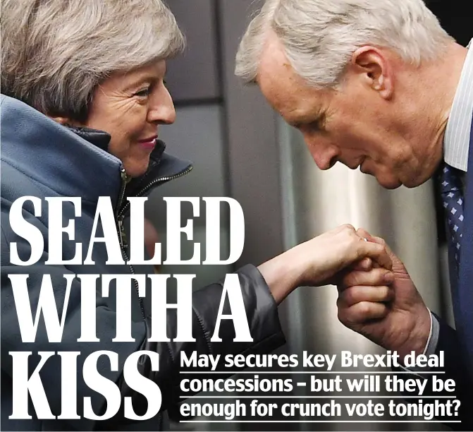  ??  ?? Rapprochem­ent: The Prime Minister is welcomed by EU chief negotiator Michel Barnier after her emergency flight to Strasbourg last night