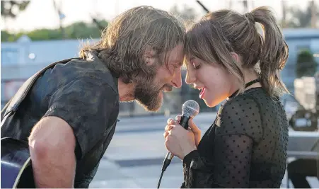  ?? WARNER BROS. ?? Bradley Cooper, left, and Lady Gaga in a scene from A Star Is Born. Cooper’s directoria­l debut with Lady Gaga is among the selections for this year’s Toronto Internatio­nal Festival, which runs Sept. 6 to 16.