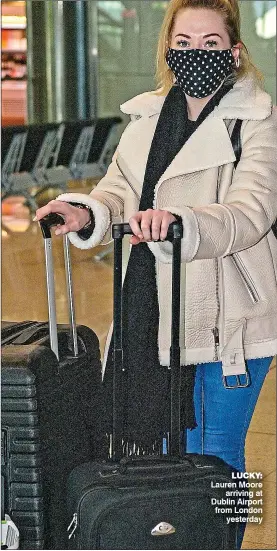 ??  ?? LUCKY: Lauren Moore arriving at Dublin Airport from London yesterday