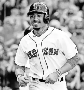  ?? WINSLOW TOWNSON, USA TODAY SPORTS ?? Red Sox outfielder Mookie Betts has more than delivered on his first-round status and should be near the top of everybody’s fantasy draft list for 2017.