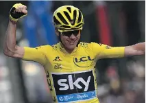  ?? JEFF PACHOUD/GETTY IMAGES ?? Great Britain’s Chris Froome celebrates on Sunday in Paris. The Tour is “the most beautiful race in the world,” he said.
