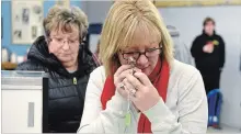  ?? STEVE HENSCHEL
NIAGARA THIS WEEK ?? Tammy Shaver examines a ring before the start of bidding at Luke’s Auctions for the Police Bike and Recovered Goods Auction.