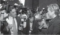  ?? Associated Press ?? This photo from Sept. 9, 1999, shows WNBC television reporter Gabe Pressman as he questions first lady Hillary Rodham Clinton during her visit to Queens in New York City.