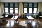  ?? MATT ROURKE — THE ASSOCIATED PRESS ?? Desks are spaced apart Friday ahead of planned in-person learning at Nebinger Elementary School in Philadelph­ia.