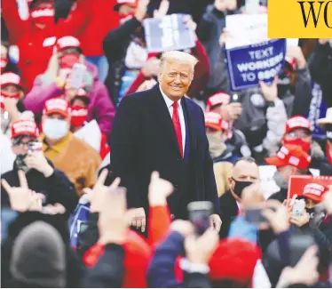  ?? CHRIS SZAGOLA / THE ASSOCIATED PRESS ?? President Donald Trump arrives to speak at a campaign rally Monday at HoverTech Internatio­nal in Allentown, Pa.