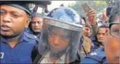  ??  ?? Politician Nur Hossain (centre), the prime accused, is taken out of the court in Dhaka on Monday after the verdict. REUTERS