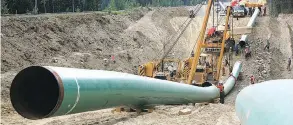  ?? POSTMEDIA NETWORK FILES ?? A May 2013 photo of Kinder Morgan’s Anchor Loop Project, in Jasper, B.C. Sources say despite protests, Ottawa is backing the company’s Trans Mountain pipeline project.