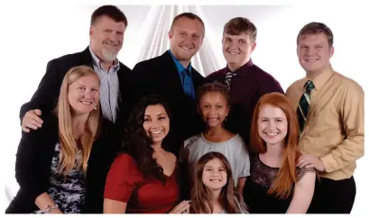  ??  ?? Christina and Rob Dennis and their family. The Dennises have been foster parents for more than 10 years and have adopted children through the foster-care system.