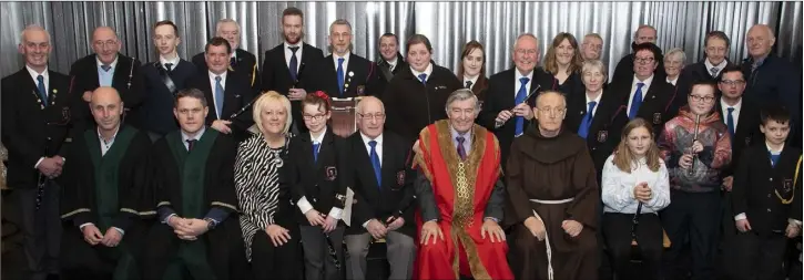  ??  ?? Band members and council representa­tives at the civic reception for St Patrick’s Fife and Drum Band in the Irish National Heritage Park.