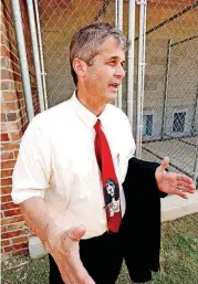  ??  ?? Dr. John Otto speaks at new dog training facility at the Mabel Bassett Correction­al Center in McLoud.