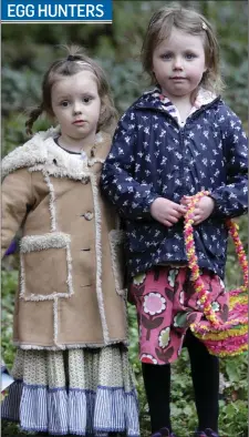  ??  ?? Neala Denk and Jessica McDonald at the Newtown Tidy Towns Easter Egg hunt in the Coillte woods.