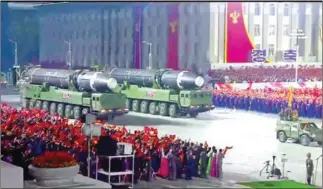  ?? KOREAN CENTRAL TELEVISION ?? Kim Jong-un watched his new ICBM missiles in Pyongyang.