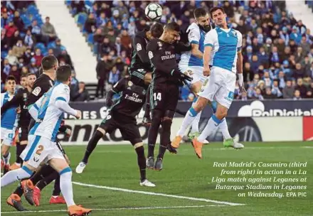  ?? EPA PIC ?? Real Madrid’s Casemiro (third from right) in action in a La Liga match against Leganes at Butarque Stadium in Leganes on Wednesday.