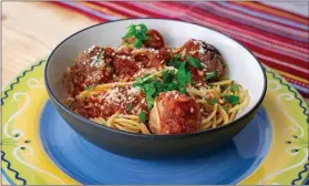  ?? FAMILY FEATURES ?? Turkey and Beef Meatballs with Whole-Wheat Spaghetti.