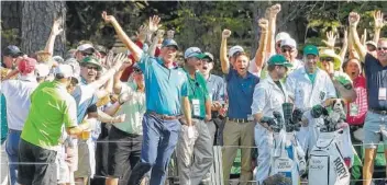  ?? THE ASSOCIATED PRESS ?? Matt Kuchar reacts after his hole-in-one on the 16th hole during the final round of the Masters golf tournament Sunday in Augusta, Ga.