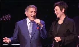  ?? ?? ‘He loved to sing for everybody. For him, it wasn’t anything other than giving the gift of music to people’ … Tony Bennett and kd lang perform in New York in 2002. Photograph: