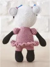  ??  ?? Her pretty outfit gets a ballerina trim – nice and tactile for little fingers and easily made.