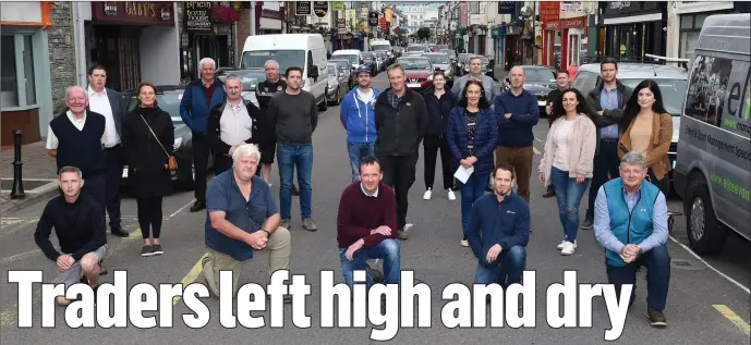  ?? Photo by Michelle Cooper Galvin ?? Killarney’s High Street traders are hitting out at the new parking plan on the street. Pictured with Cllrs Niall Kelleher, Niall O’Callaghan and Maura Healy Rae in High Street on Monday.