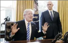  ?? OLIVIER DOULIERY/ABACA PRESS ?? U.S. President Donald Trump reacts after Republican­s abruptly pulled their health care bill from the House floor in the Oval Office of the White House on Friday in Washington, D.C.