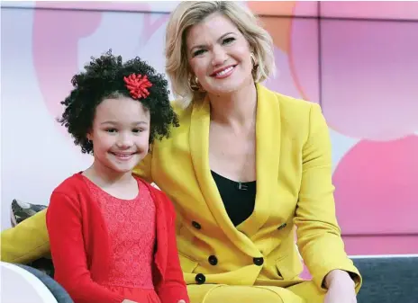  ?? Photo: Richard Dobson ?? YOUNG NEWSREADER: At Channel 10 in Pyrmont in Sydney is Dayleni Drike Sanchez and Sarah Harris. Dayleni is the winner of Australia’s Best Kids Newsreader competitio­n.