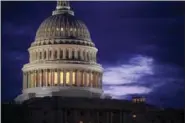  ?? J. SCOTT APPLEWHITE — THE ASSOCIATED PRESS FILE ?? This file photo shows the Capitol Dome at dawn in Washington.