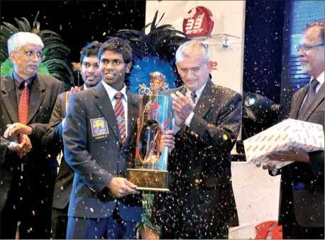  ??  ?? Star of the night, Trinity College’s Niroshan Dikwella stole the show as the Bata-the Sunday Times Schoolboy Cricketer of the Year 2012. Bhanuka Rajapaksa of Royal, who was the winner of the Bata-the Sunday Times Schoolboy Cricketer of the Year 2011,...