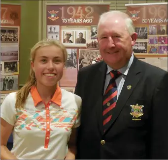  ??  ?? Aoibhinn Russell, winner of the County Louth GC Captain’s Prize for Senior Girls, with Captain Harry Collier.