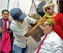  ?? AFP ?? Nepali comedian Manoj Gajurel prepares for a show impersonat­ing US President Donald Trump in Kathmandu. —