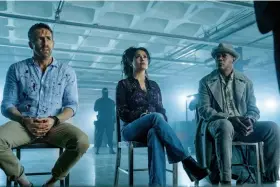  ??  ?? Ryan Reynolds, Salma Hayek and Samuel L. Jackson star in “Hitman’s Wife’s Bodyguard.”