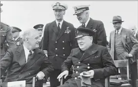  ??  ?? US President Roosevelt and British Prime Minister Winston Churchill seated on the quarterdec­k of HMS Prince of Wales during the Atlantic Conference, 10 August 1941. The Atlantic Charter was issued on 14 August 1941.