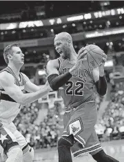  ?? [AP PHOTO] ?? Chicago Bulls forward Taj Gibson, right, was traded to the Oklahoma City Thunder on Thursday. Gibson will make the Thunder a better defensive team.