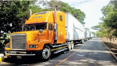  ?? FOTO: EFE ?? IMPACTO.
Camiones parados en Peñas Blancas en la frontera entre Nicaragua y Costa Rica.