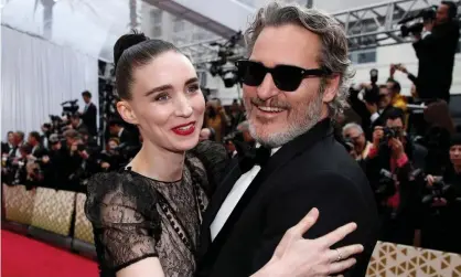  ?? Photograph: Mike Blake/Reuters ?? Rooney Mara and Joaquin Phoenix at the 2020 Oscars in February.