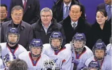  ?? ANDREW NELLES/ USA TODAY SPORTS ?? South Korea’s Moon Jae-in, left, in line with the North’s Kim Yo Jong.