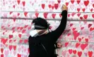  ?? Photograph: Anadolu Agency/Getty Images ?? The memorial wall for Covid-19 victims in London. ‘As there is very little data on the severity of disease caused by Omicron, the only sensible approach has to be preventati­ve and cautious,’ writes one reader.