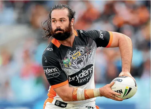  ??  ?? Wests Tigers captain Aaron Woods is seriously considerin­g offers to play for rival NRL clubs.